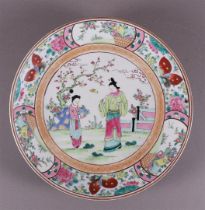 A polychrome porcelain dish, Japan, around 1900.