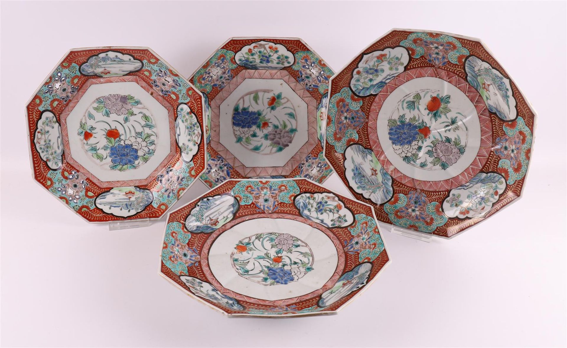 Four octagonal porcelain serving dishes, Japan, Meiji, early 20th century.