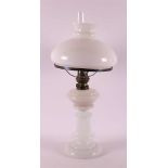 A white opaline glass table oil lamp, late 19th century.