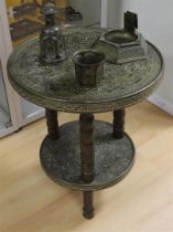 A smoking table with brass top, ca. 1930.