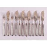 A set of six second grade 835/1000 silver fish cutlery, year letter 1907.