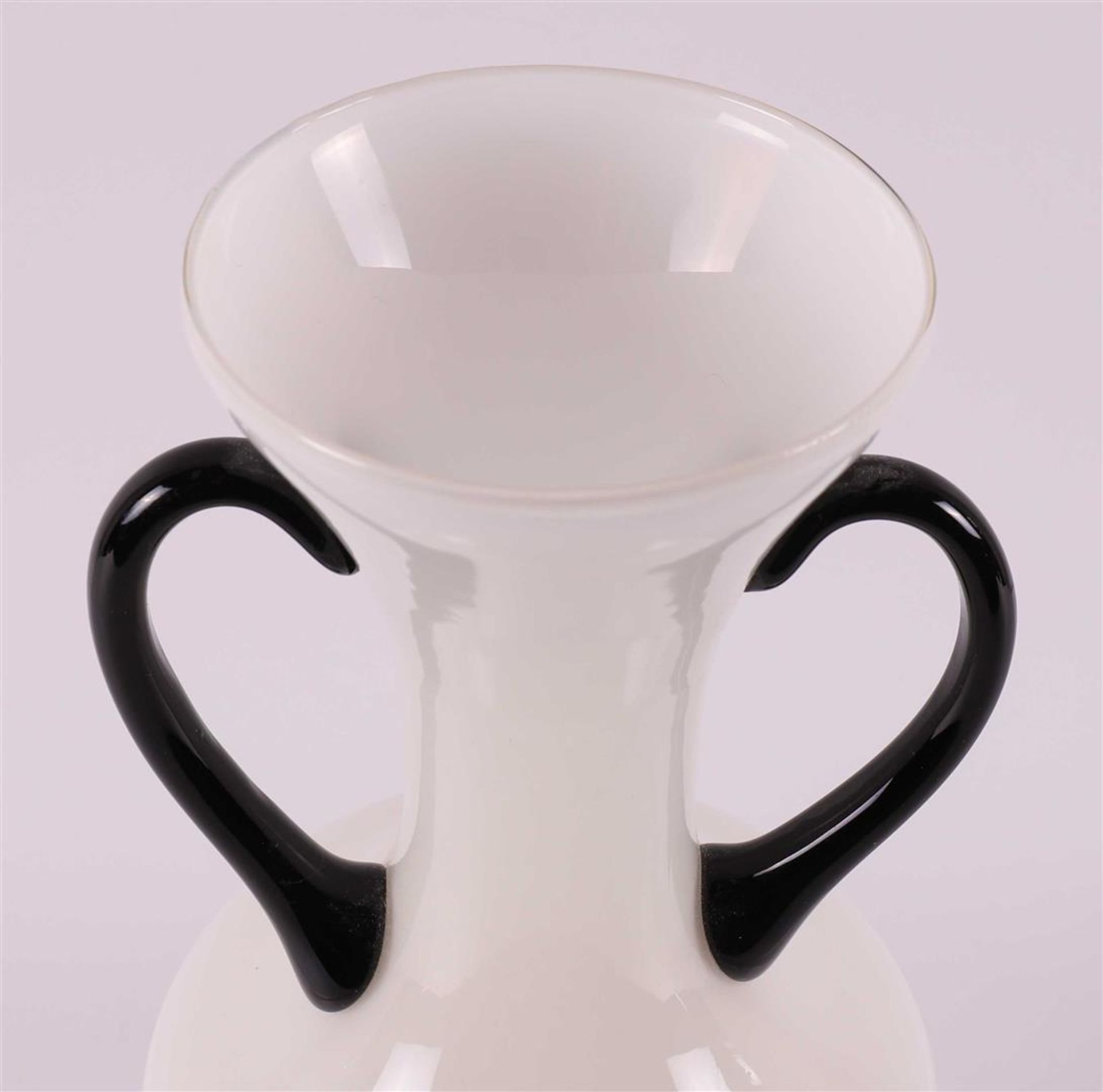 A white glass Art Deco vase with black glass handles and base, France, ca. 1920 - Image 3 of 4