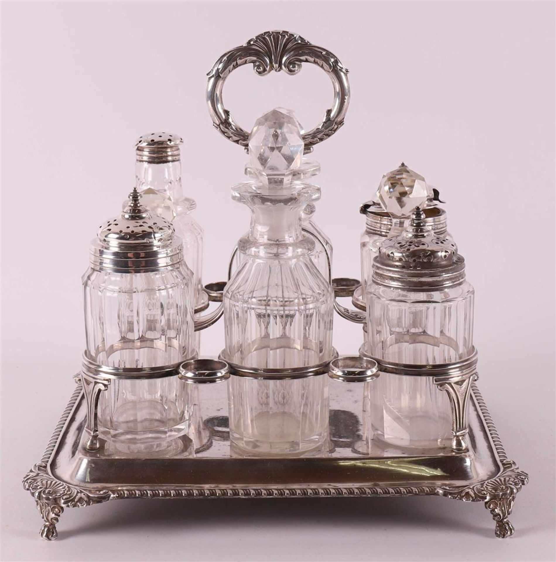 A table set with silver frames and silver case, England, London,