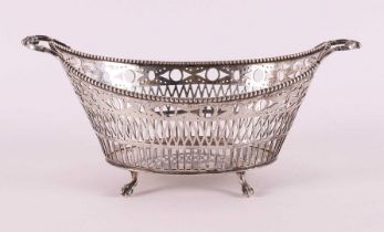 A round silver chocolate or. Cork basket, year letter 1910.