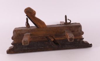 An elm wood profile planer, dated 1803.