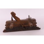 An elm wood profile planer, dated 1803.