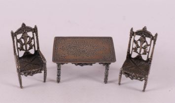 Etagere silver. A table with two chairs, 20th century.