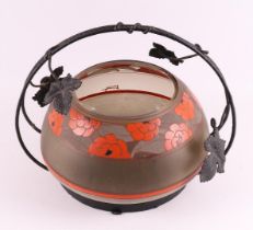 A round Art Deco fruit bowl in wrought iron frame, France, 1920-1925.