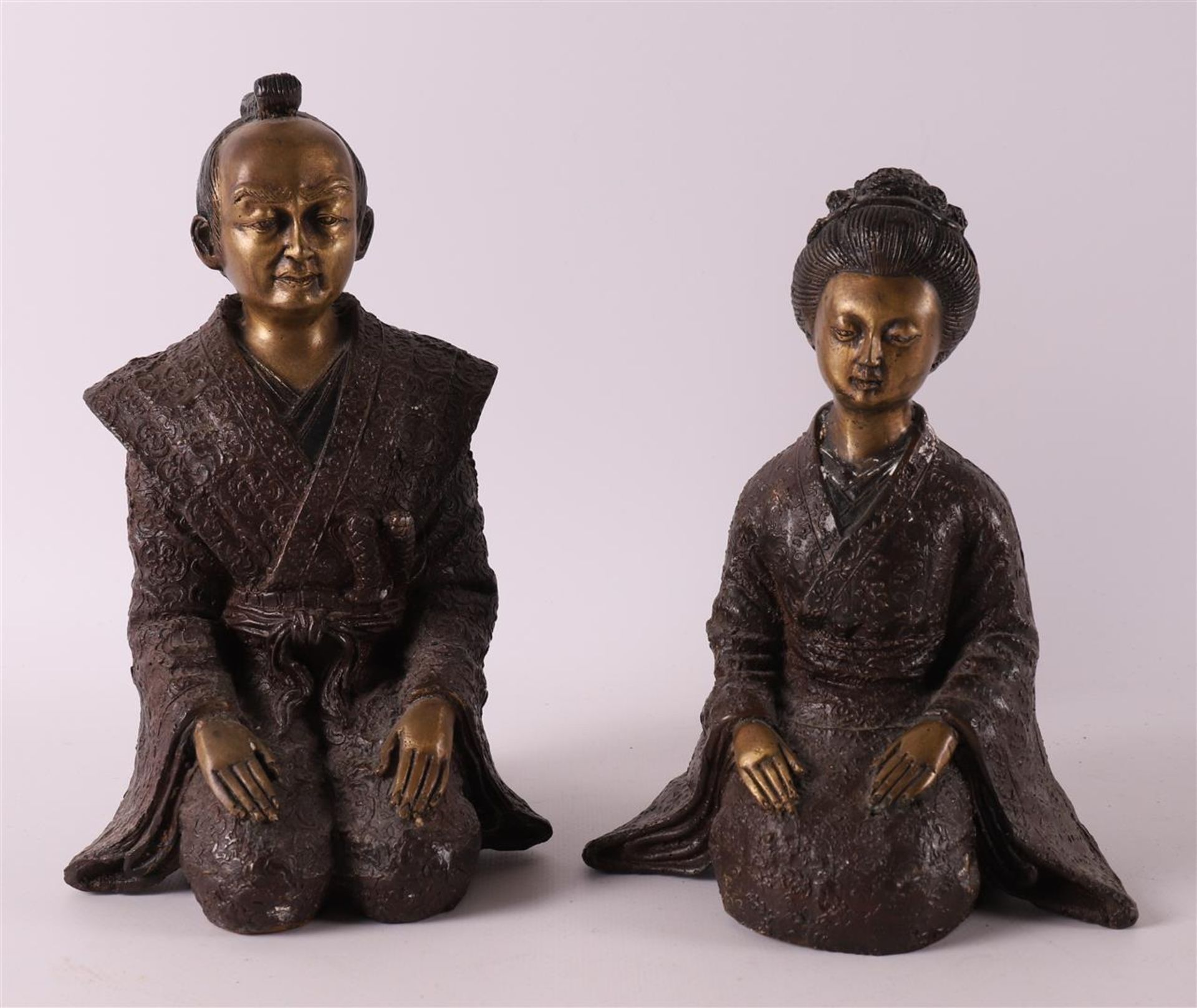 A bronze kneeling samurai and geisha, Japan, after an antique example, 20th cent