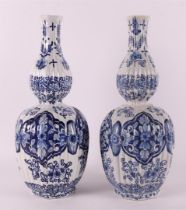 A pair of blue/white Delft earthenware pumpkin-shaped vases, 19th century.