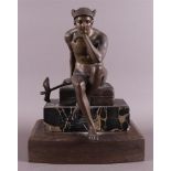 A bronze seated Hermes on cushion and marble base, ca. 1920