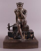 A bronze seated Hermes on cushion and marble base, ca. 1920