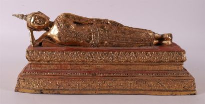 A gilded reclining Buddha, Thailand, 20th century.