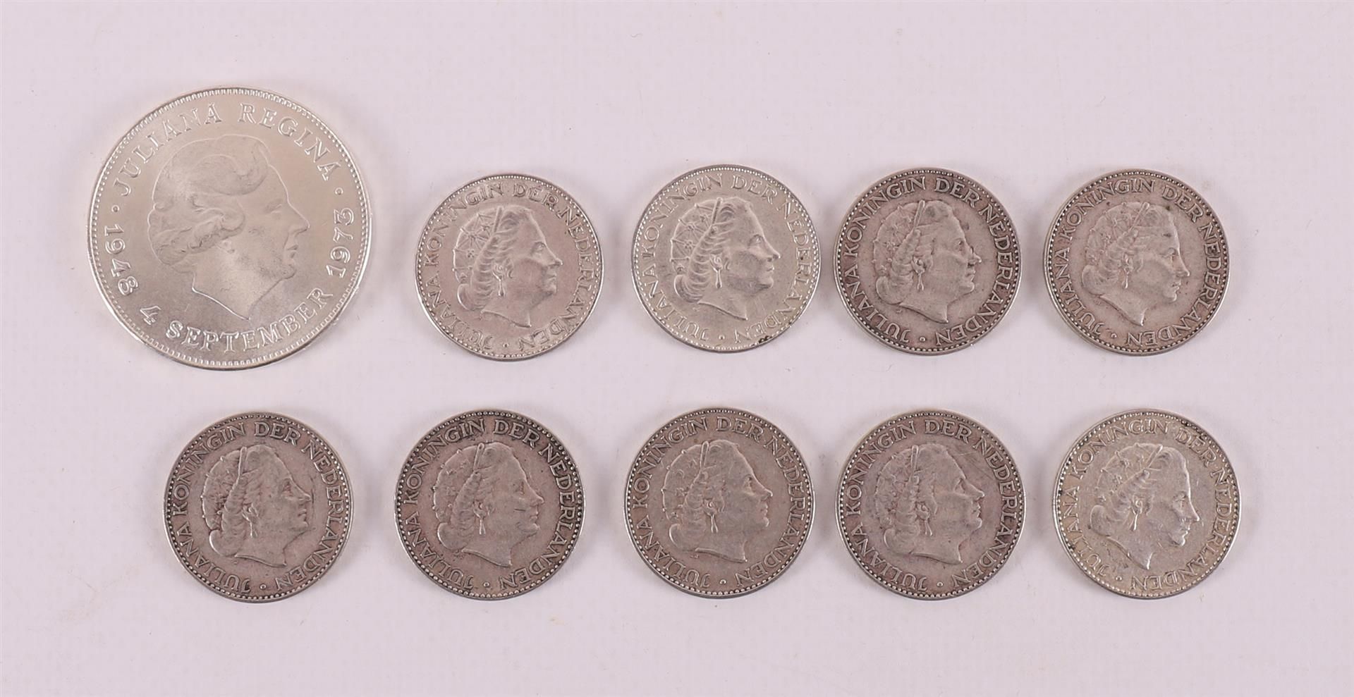 A silver ten guilders, Juliana 1973 and nine guilders.