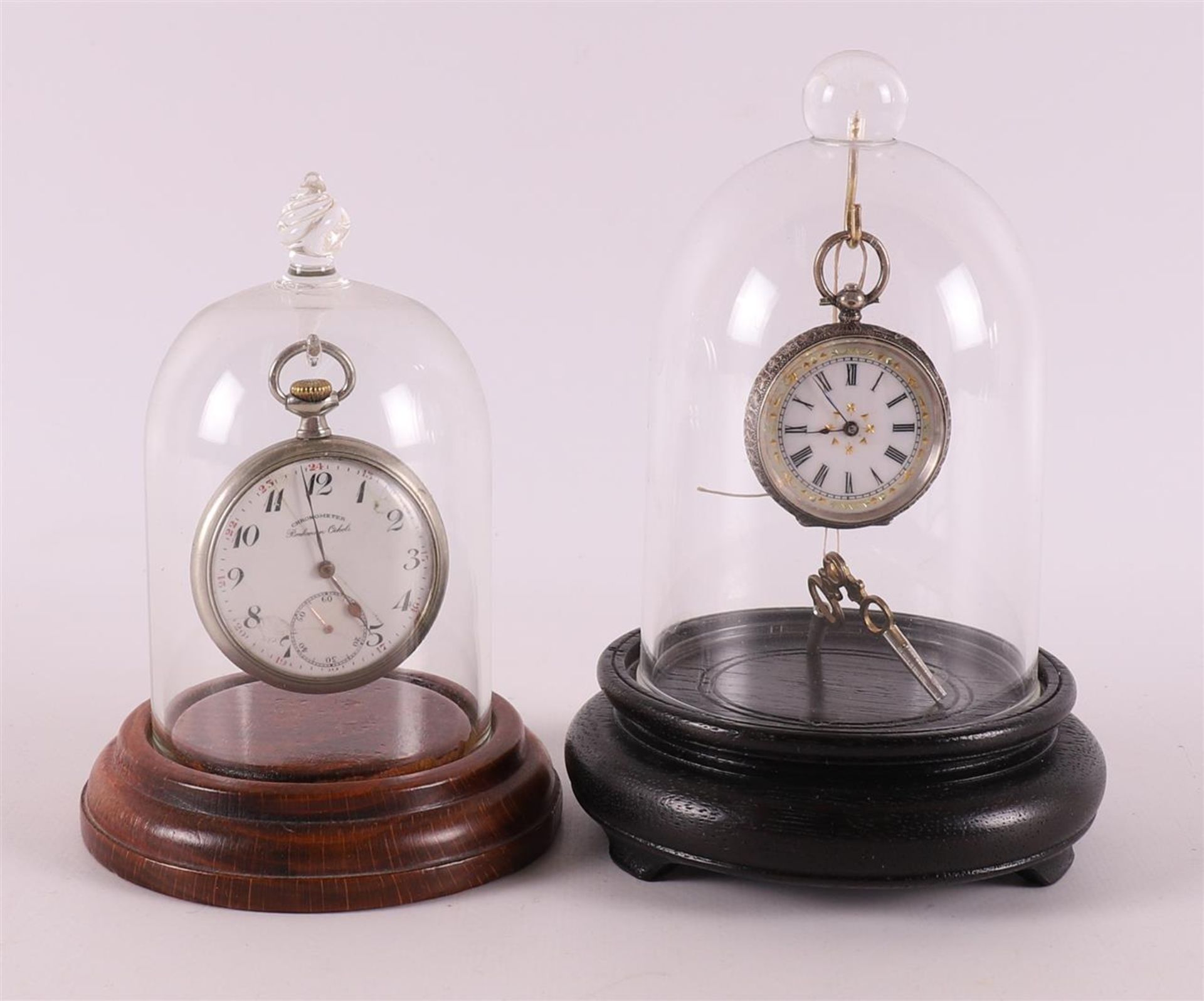 Two various men's vest pocket watches in silver cases, around 1900