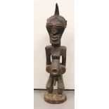A carved wooden Songye Nkisi Fetish force statue, Congo, Africa, 20th century