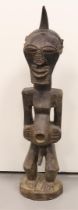 A carved wooden Songye Nkisi Fetish force statue, Congo, Africa, 20th century