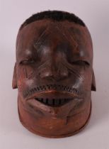 A wooden makonde 'Helmet-mask', Tanzania, Africa, late 20th/early 21st century.