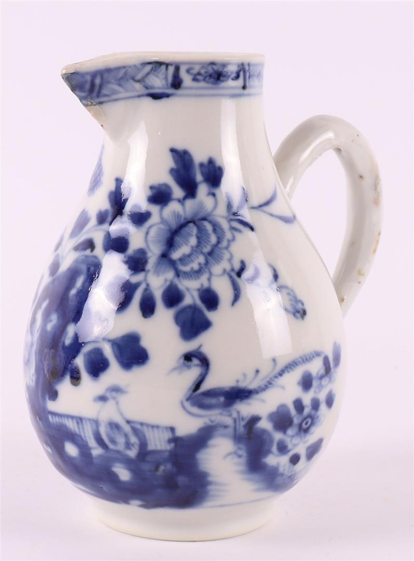 A blue and white porcelain milk jug, China, Qianlong 18th century.