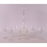 A clear crystal decanter with glasses, 1st half of the 20th century.