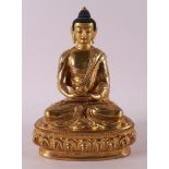 A gilded bronze seated Buddha on a lotus crown, Thailand, 20th/21st century.