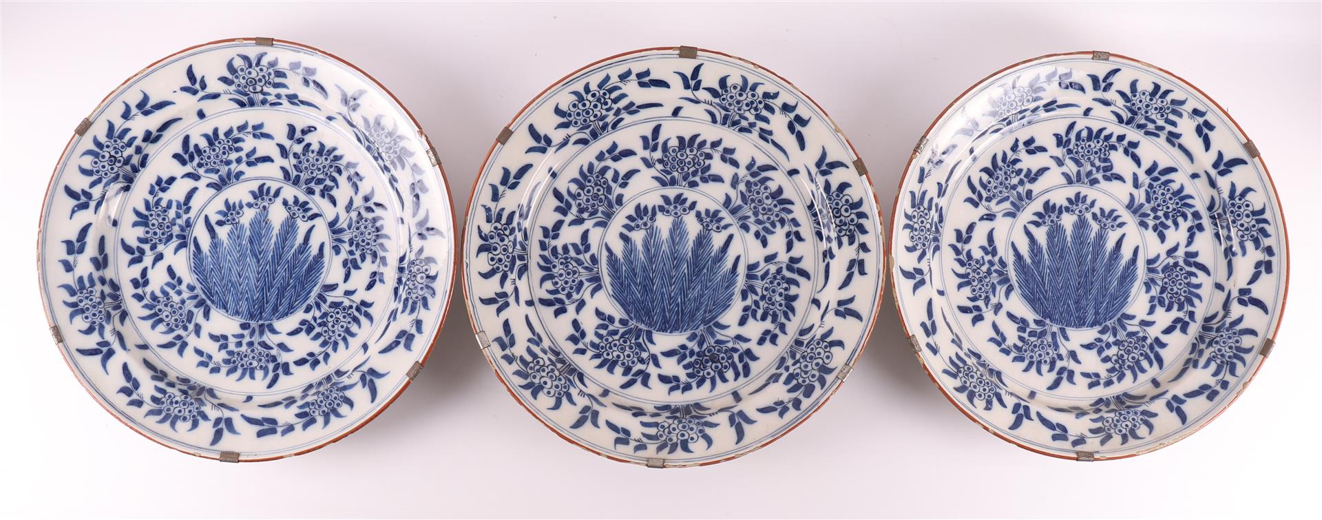 Three blue/white Delft earthenware 'Mimosa' dishes, Holland, 18th century.