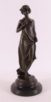 A brown patinated bronze sculpture of a woman after an antique example, 21st cen