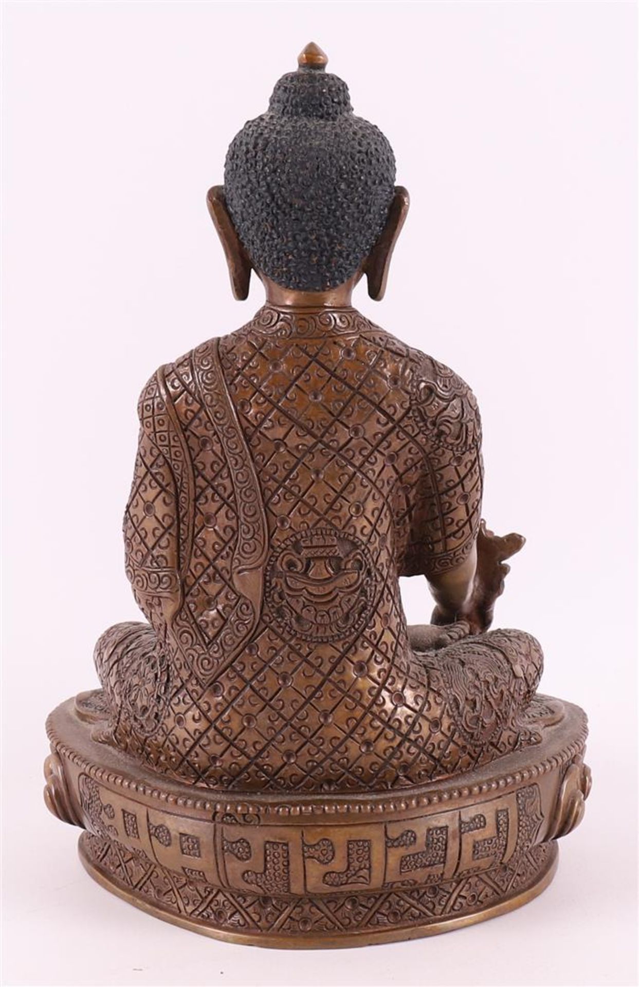 A bronze seated Buddha in lotus position on lotus crown, India, 20th century - Image 2 of 4