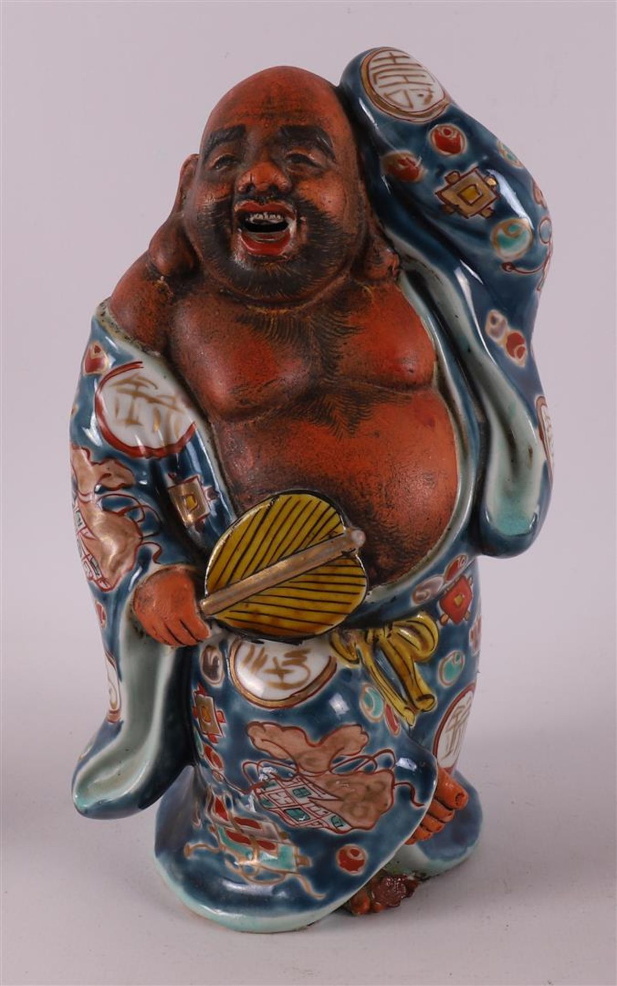 A polychrome porcelain Hotei, Japan, Meiji, around 1900. - Image 2 of 16