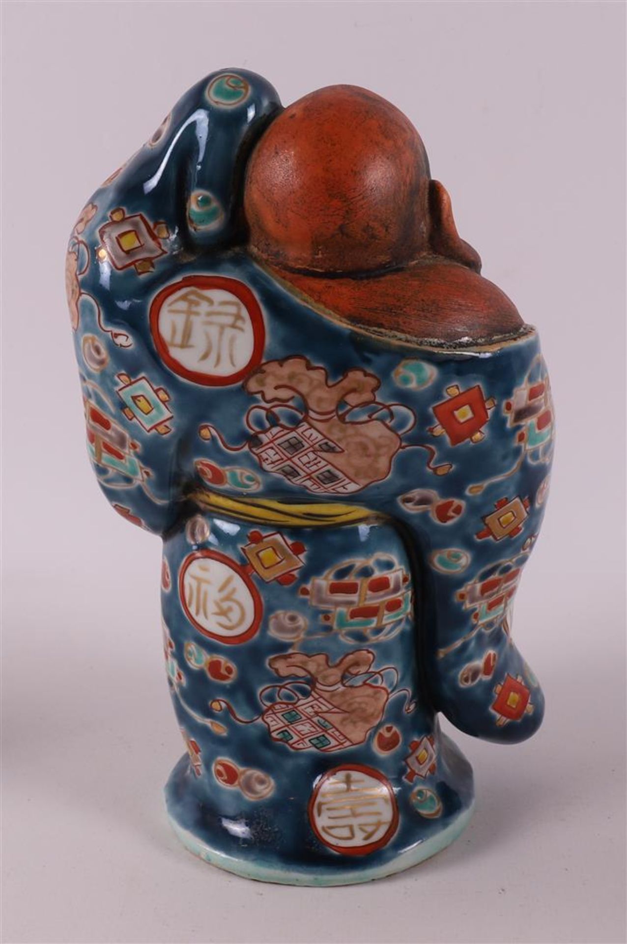 A polychrome porcelain Hotei, Japan, Meiji, around 1900. - Image 3 of 16