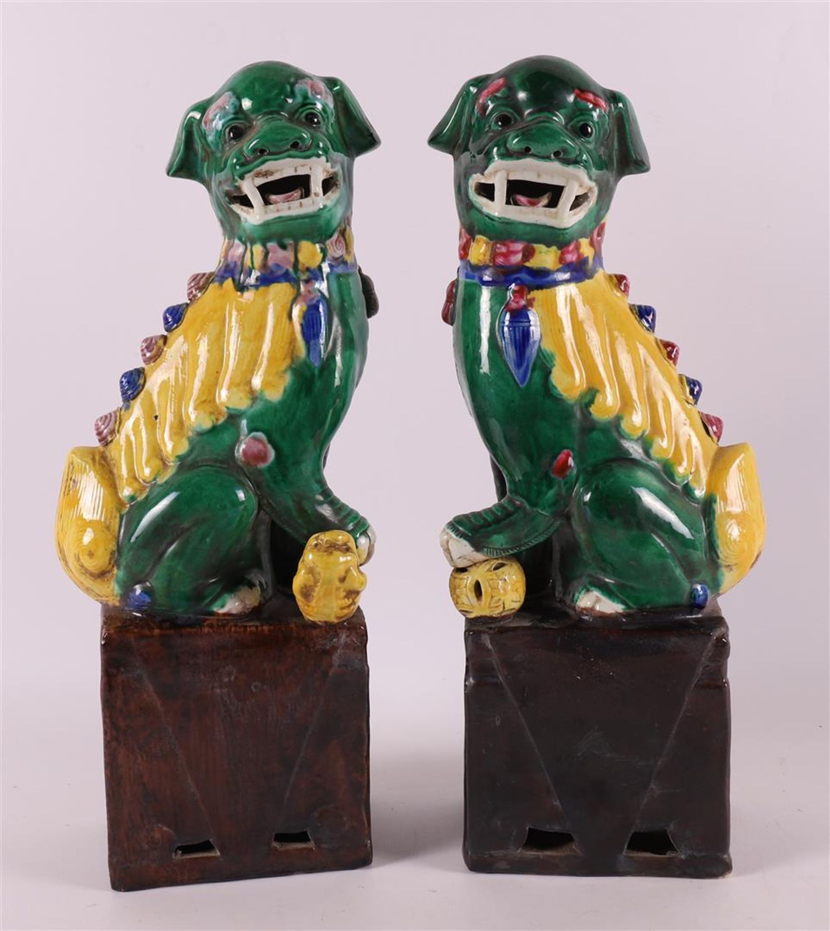 A pair of Sansai porcelain Dog of Foo, China, 20th century.