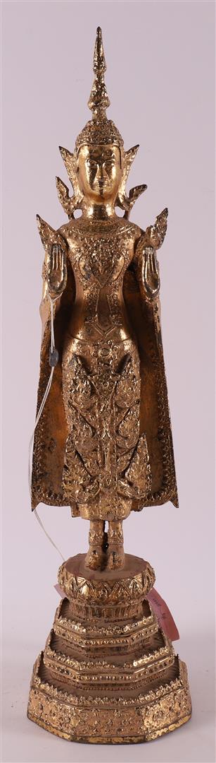 A gilded bronze standing Buddha, Thailand, 19th century or older.