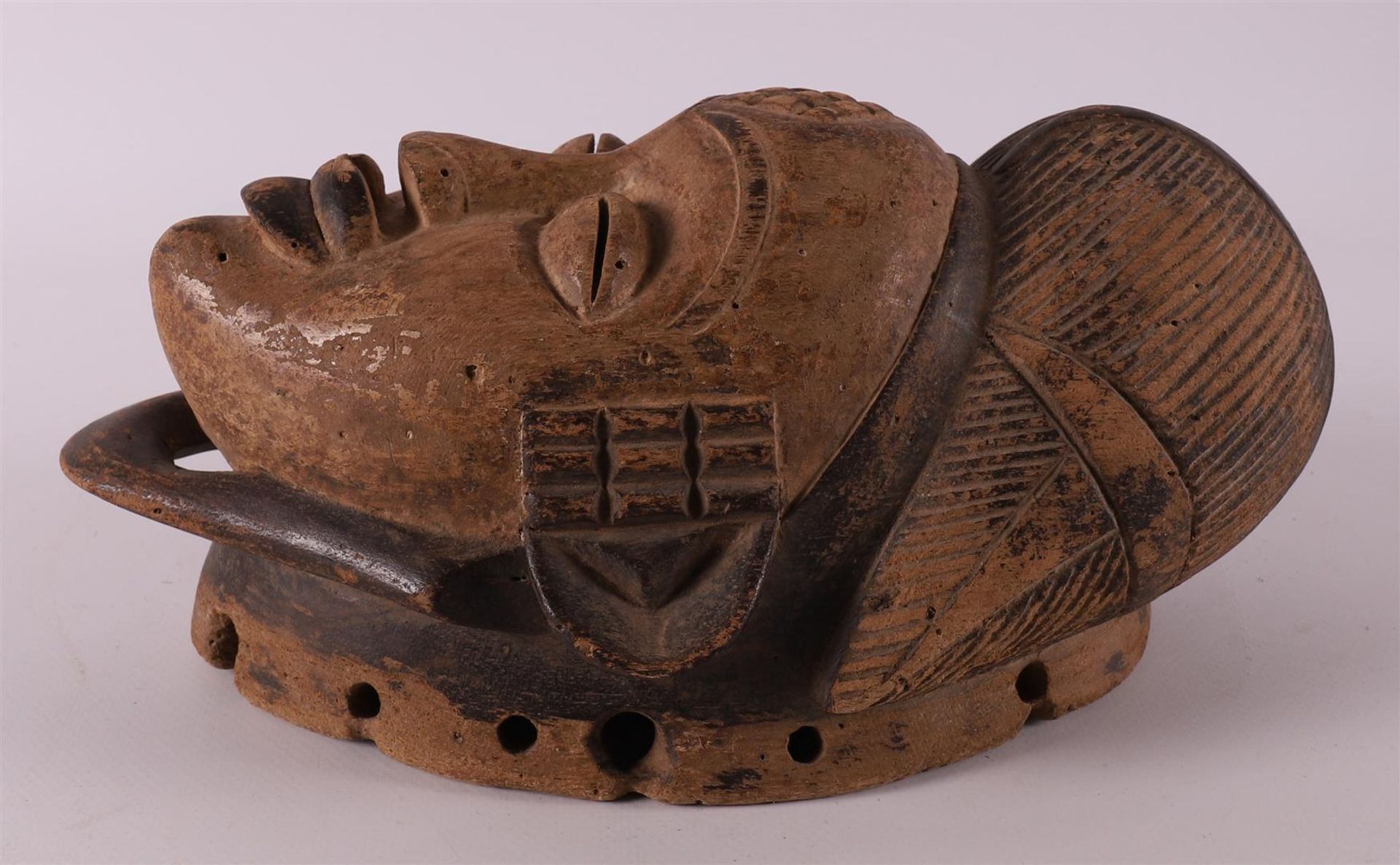 A carved wooden Punu mask, Gabon, Nigeria, Africa, 2nd half of the 20th century - Image 3 of 4