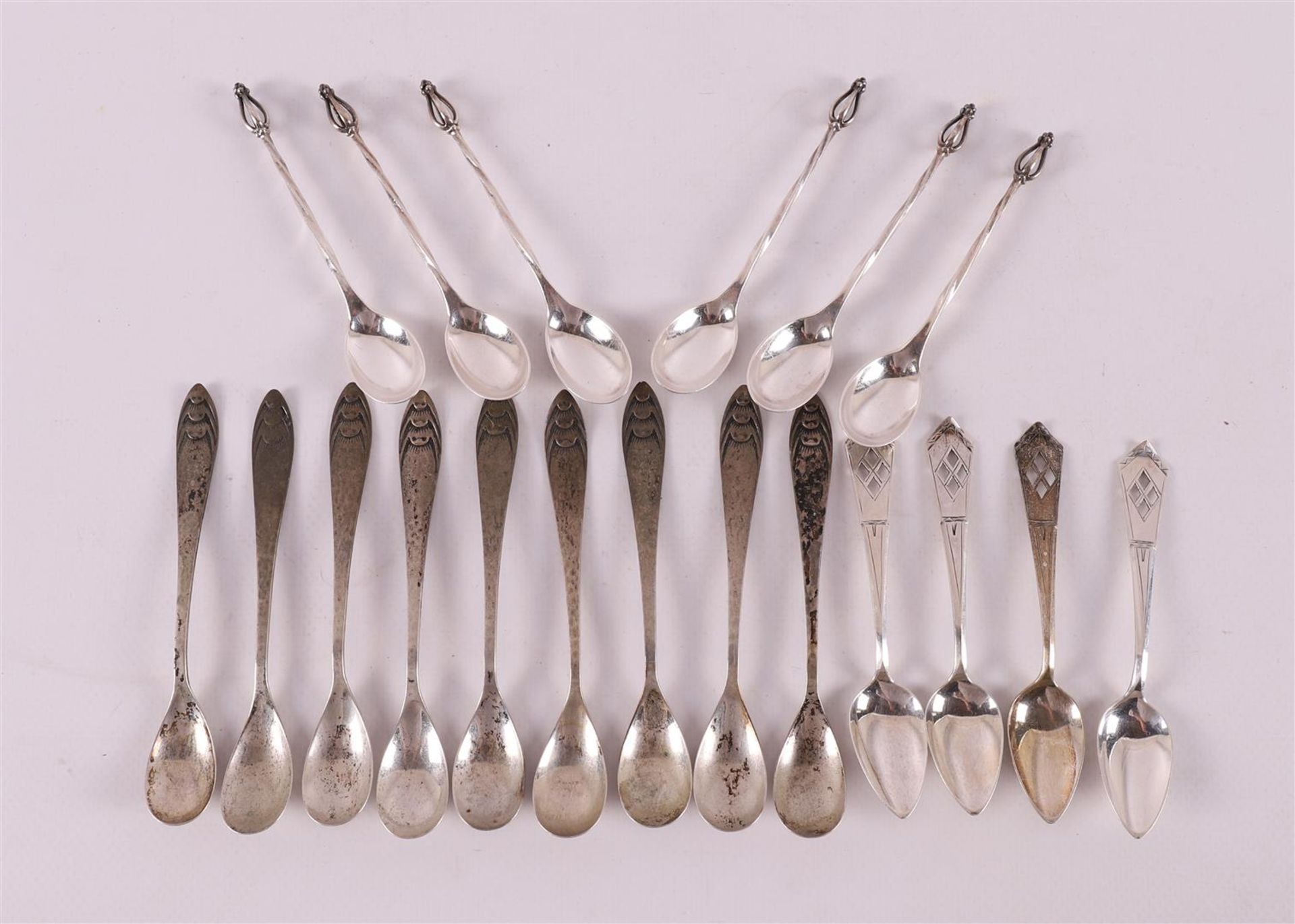 A lot of various second grade 835/1000 silver teaspoons, including early 20th ce