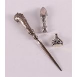 A first grade 925/1000 silver letter opener on a pistol grip, around 1900.