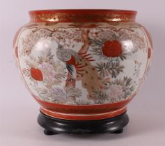 A kutani porcelain cache pot on a loose base, Japan, Meiji, around 1900.