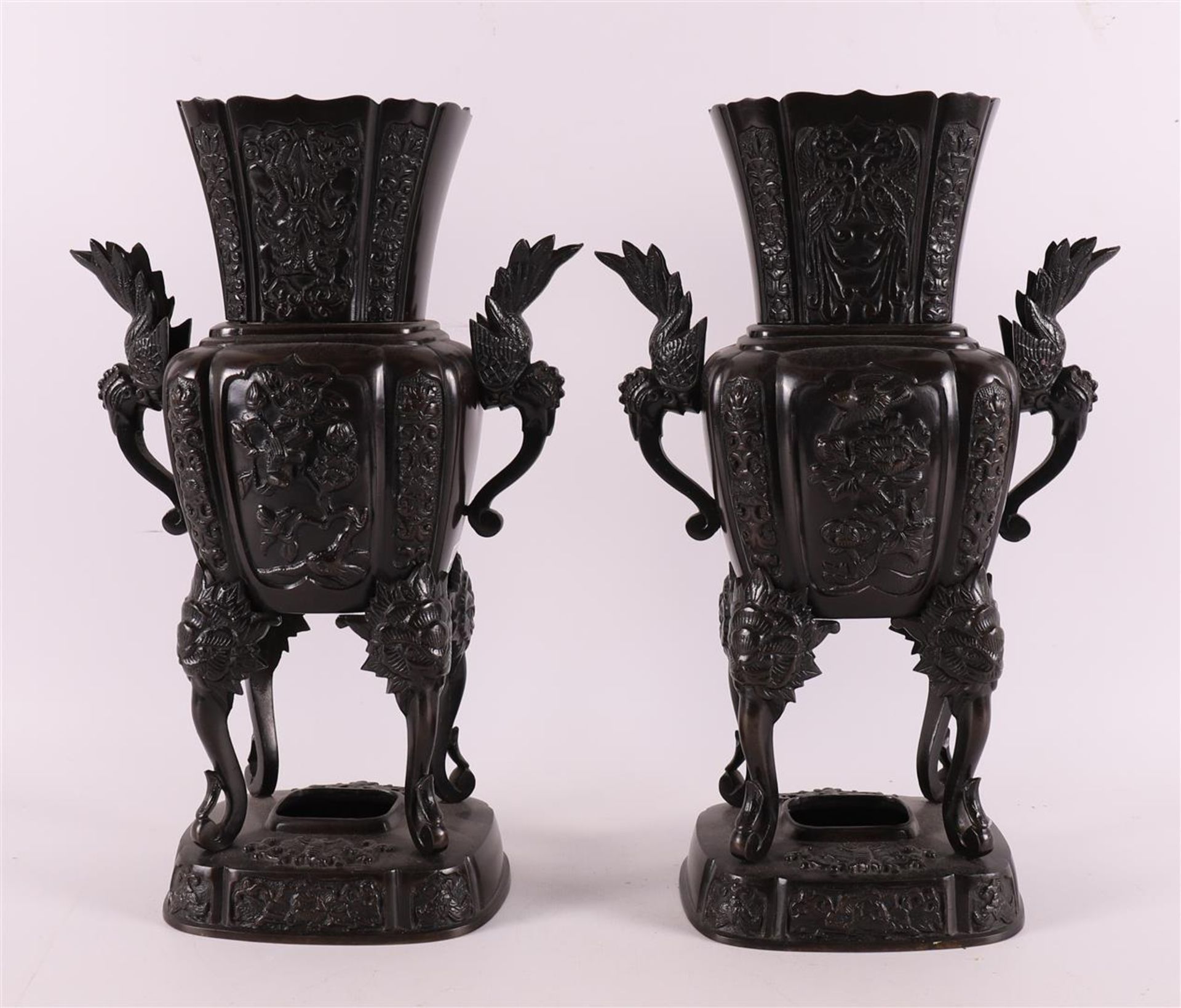 A pair of brown patinated bronze incense vases with handles, Japan, Meiji,