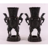 A pair of brown patinated bronze incense vases with handles, Japan, Meiji,