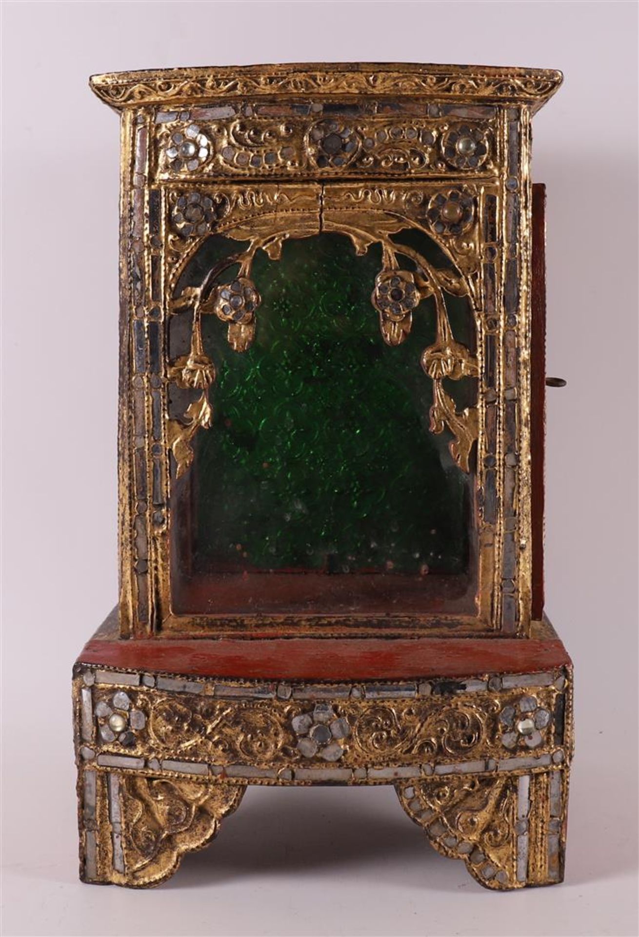 A gilded metal relic display cabinet, China 19th/20th century.