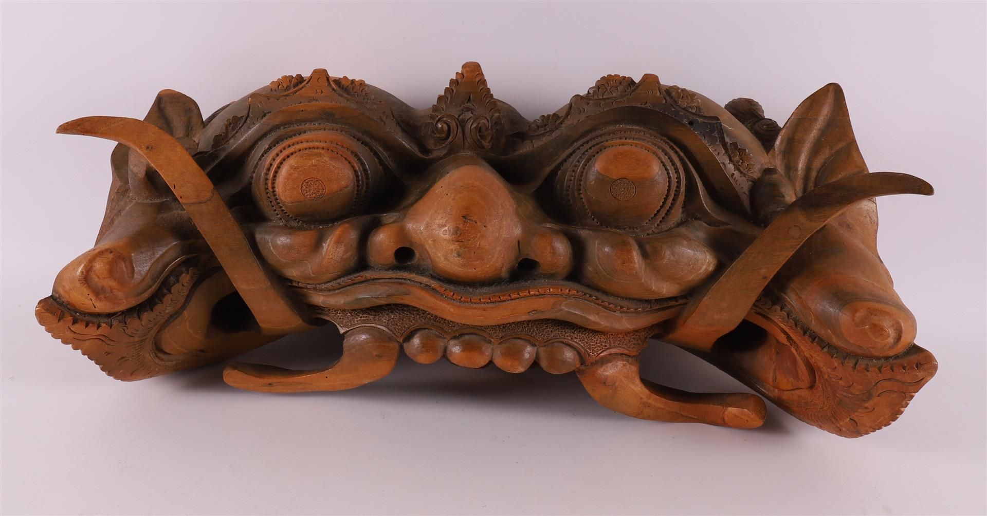 A carved wooden dragon head ornament, Indonesia, 20th century