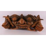 A carved wooden dragon head ornament, Indonesia, 20th century