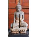 A carved wooden seated Ava Buddha on lotus crown, Burma 15th/16th century.