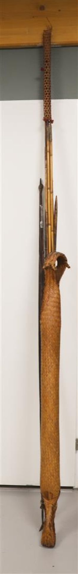 Papua New Guinea. A bow with arrows and wicker quiver, 2nd half of the 20th cent