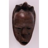 Ethnographic/tribal. A wooden mask, Basonge, Congo, Africa, 2nd half of the 20th