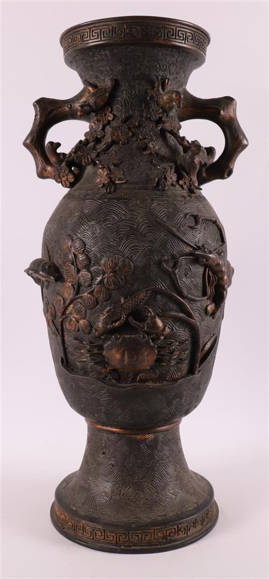 A brown patinated bronze baluster-shaped vase with handles, China,