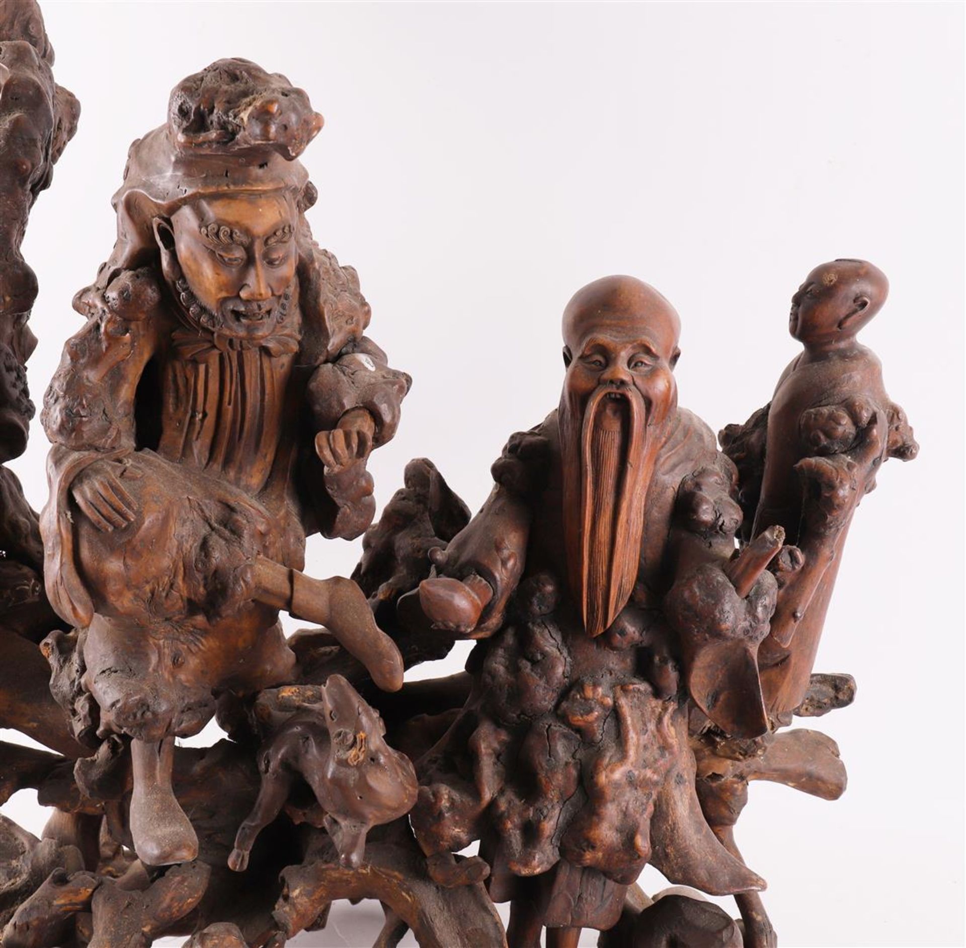 A carved burr walnut immortal on a stump, China, around 1900 - Image 3 of 8