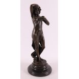 A brown patinated bronze sculpture of a woman, after an antique example, 21st ce