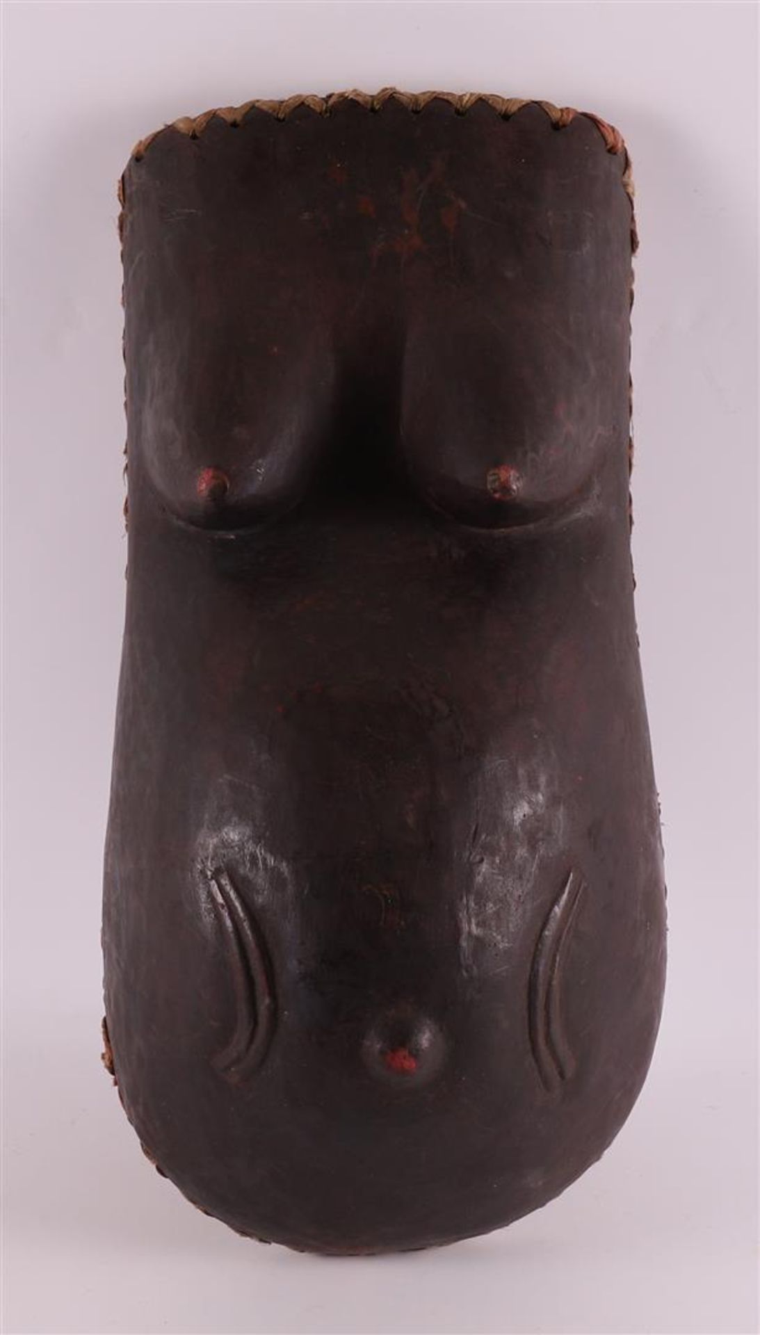 A wooden ceremonial belly mask 'Njorowe', Makondé, Mozambique/Tanzania,