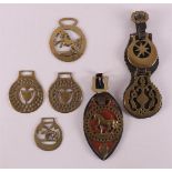 A lot of various brass horse medallions, England, 19th century.