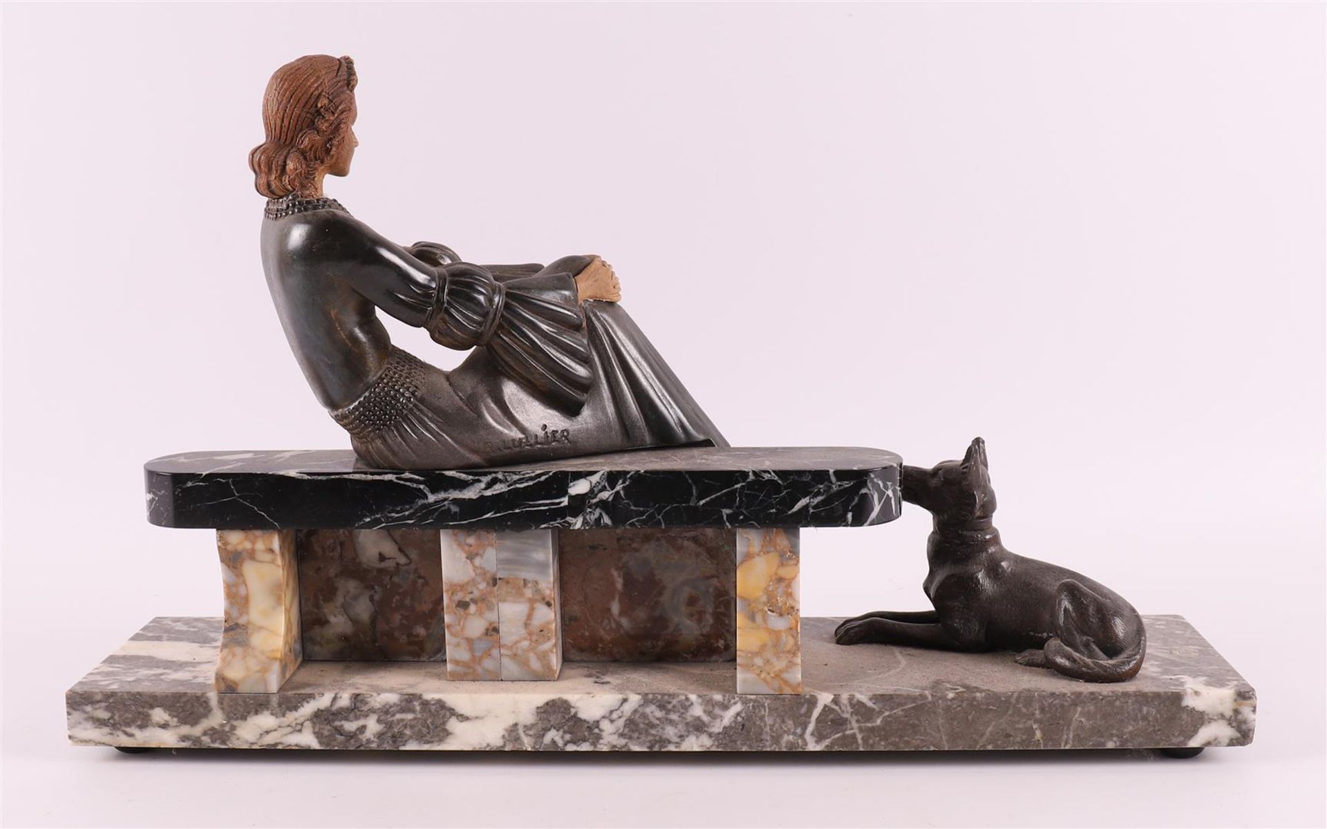 A white metal Art Deco sculpture of a lady on a bench, France, ca. 1920. - Image 2 of 7